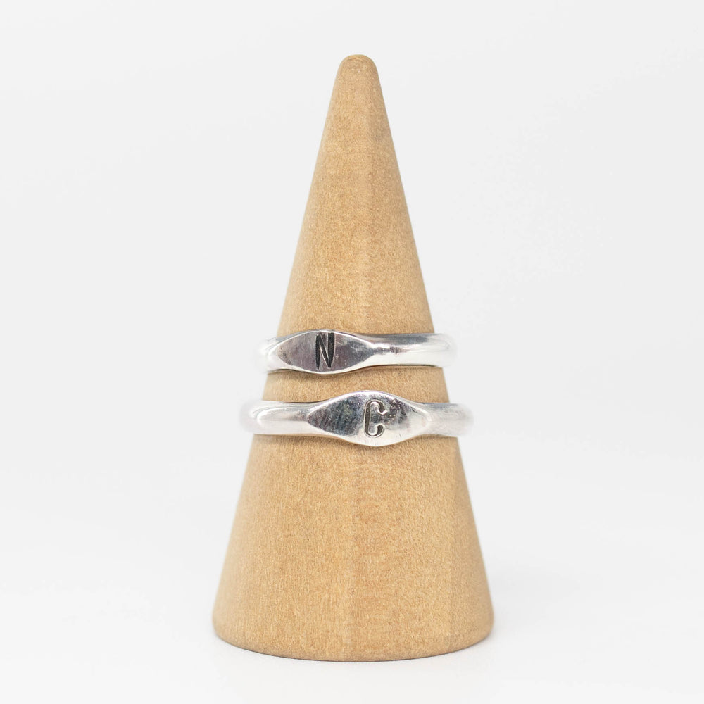 The Signature Initial Ring